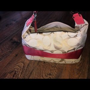 Coach pink and tan hobo bag